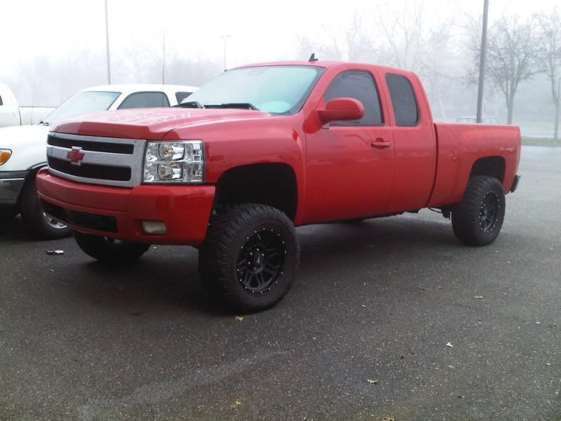 Re pics of red trucks with black wheels