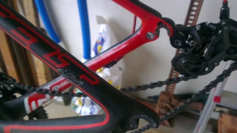 chipped carbon bike frame